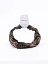 Vincha de tela plisada color negro con nudo central.