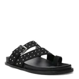 Sandalias Miss Carol modelo Talira de color negro, con diseño plano, tiras dobles decoradas con tachas metálicas plateadas, hebilla ajustable y tira separadora para el dedo.