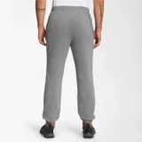 Pantalón de jogging gris, con cintura elástica ajustable con cordón, bolsillos laterales y logo estampado en la pierna izquierda.