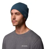 Gorro de punto tipo beanie de la marca Columbia, en color azul, con diseño de tejido acanalado y logo de la marca bordado en el lateral.