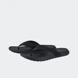 Ojotas negras con tiras superiores de tela suave y suela exterior ligera y duradera.