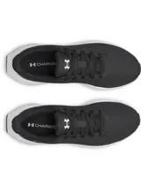 Championes de running Under Armour modelo Ascend, color negro con entresuela blanca. Confeccionados con malla transpirable y refuerzos en el mediopié, cuentan con amortiguación Charged+ Cushioning para mayor absorción de impactos y suela de goma resistente.
