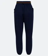 Pantalón harem azul marino de viscosa con cintura elástica, cordón ajustable, bolsillos laterales y puños elásticos.