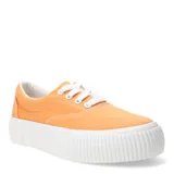 Championes de lona color naranja con plataforma blanca acanalada y cordones blancos.