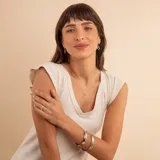 Esclava rígida de plata 925 con acabado satinado y diseño de cinta ancha.