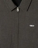 Campera Obey modelo Luther Blouson Jacket, de diseño tipo bomber en color negro con sutil patrón a cuadros y cierre frontal con cremallera. Presenta bolsillos diagonales ribeteados y el logo bordado de la marca en el pecho.