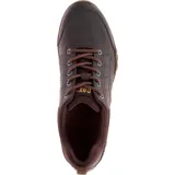 Championes Caterpillar modelo Instruct, color marrón, con diseño casual y flexible. Presenta capellada de cuero, cierre con cordones, logo de la marca en el lateral y suela de goma con relieve.