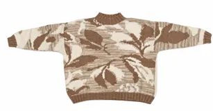 Buzo tejido a mano con diseño jacquard orgánico de formas inspiradas en el ceibo en tonos marrón, beige y blanco. Cuenta con cuello alto y terminaciones en rib.