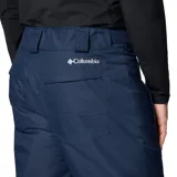 Pantalón de esquí y deportes de nieve color azul marino, con tecnología impermeable Omni-Tech y forro térmico reflectante Omni-Heat. Cuenta con cintura ajustable, bolsillos con cierre, polainas internas y refuerzos en la parte inferior de las piernas.