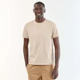 Remera recta de punto lisa color beige, de manga corta y cuello redondo.