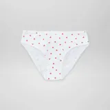 Pack de 7 braguitas de algodón en colores rosa, blanco, azul y rojo, con estampados de lunares y corazones.