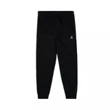 Pantalón de jogging negro de algodón con cintura elástica ajustable con cordón, bolsillos laterales y logo Jumpman bordado en blanco.