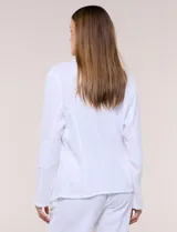 Chaqueta de algodón verde militar, marca Dash, con bolsillos simulados en el frente y terminaciones desflecadas.