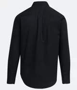 Camisa verde militar de manga larga en sarga de algodón, con cuello clásico, cierre frontal abotonado y dos bolsillos con solapa abotonada en el pecho.