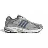 Championes adidas Response CL de estilo retro, confeccionados en una combinación de malla y gamuza en tonos grises. Presentan las icónicas tres tiras laterales en color gris oscuro, entresuela con tecnología adiPRENE para mayor amortiguación y suela de goma resistente.