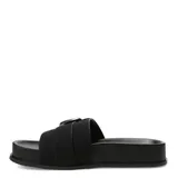 Sandalias de mujer Miss Carol modelo Zafira, color negro, tipo pala con suela plana y tira ancha decorada con una gran hebilla metálica plateada.