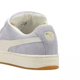 Zapatilla Puma Suede XL, color naranja quemado, con franja lateral (Formstrip) y cordones blancos. Presenta una suela de goma blanca gruesa.