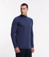 Remera deportiva térmica de manga larga color negro, con cuello alto y cremallera frontal. Presenta sisas raglán y recortes, sin estampado.