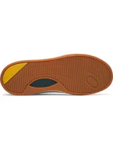 Championes Under Armour modelo Flex, de diseño urbano en color blanco con detalles en verde oscuro, amarillo y suela color caramelo. Confeccionados en cuero premium con entresuela de EVA para mayor amortiguación.