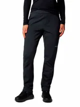 Pantalón de senderismo Columbia Titanium color negro, diseñado para actividades de alto rendimiento. Confeccionado con tecnología Omni-Shield que repele la humedad y manchas, presenta un tejido grueso y flexible con interior cepillado. Cuenta con cintura alta parcialmente elástica, bolsillos con cremallera, refuerzos en zonas clave y clips de polaina en los puños.