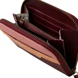 Billetera Rip Curl Boho de cuero sintético color borgoña, con detalles en rosa y beige.