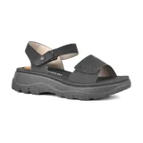 Sandalias negras con plataforma y tiras ajustables.