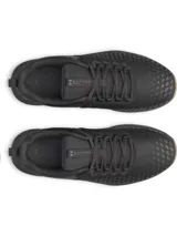 Championes deportivos Under Armour modelo Charged Engage 2, color negro con suela de goma en tono tostado. Presentan parte superior textil transpirable con estampado 3D, cordones negros y el logo de la marca en el lateral del talón.