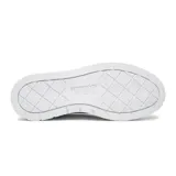 Championes Puma Karmen II de plataforma, color blanco, con diseño urbano y suela gruesa con textura ranurada.