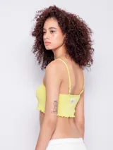 Top blanco sin mangas con breteles finos, escote cuadrado y bordado de tres caritas sonrientes en el frente.