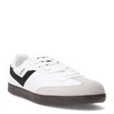 Championes urbanos Pony modelo Moma, de diseño retro inspirado en los años 70. Presentan una base blanca con detalles en negro, puntera de gamuza en tono gris claro y suela de goma color marrón. Incluyen el logo de la marca en el lateral.