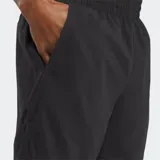 Short de running Reebok para hombre, color negro, de tejido liviano con corte versátil y largo de 5 pulgadas. Presenta cintura elástica con cordón y detalles reflectantes.