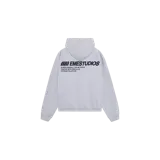 Hoodie oversize gris melange de Eme Studios, con capucha y estampado en la espalda con el logo de la marca y texto en color negro.