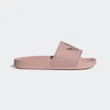 Sandalias Adidas Adilette Lite color rosa con logo dorado.