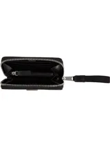 Billetera negra con cierre de cremallera y logo Tommy Jeans en el frente.