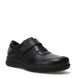 Zapatos casuales de mujer Lombardino modelo Mery, color negro, confeccionados en cuero y nobuk, con cierre de velcro en el empeine y suela de goma.