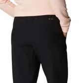 Pantalón de senderismo Columbia, color negro, con cintura ajustable, bolsillos laterales y tecnología Omni-Wick para absorción de humedad y secado rápido.