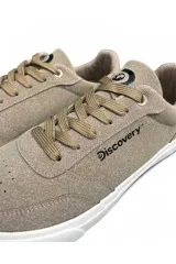 Championes deportivos Discovery modelo Casual Expedition, de color azul con cordones negros, suela blanca y detalles de la marca en el lateral.