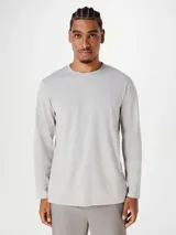 Remera básica de manga larga en color azul oscuro, con cuello redondo y corte recto.