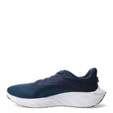 Championes de running Under Armour modelo Ascend, color azul con detalles en naranja y suela blanca. Confeccionados en tejido de malla transpirable con refuerzos sintéticos y logo de la marca en el lateral.