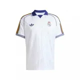 Camiseta de fútbol Adidas Originals del Real Madrid, color blanco con cuello polo y detalles en azul y amarillo en las mangas y hombros.
