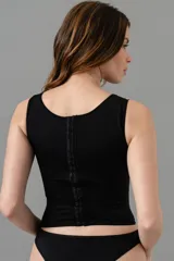 Corset con escote cuadrado y ballenas, confeccionado en lycra con estampado animal print y detalles en lycra negra.