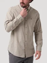Camisa de manga larga RKF confeccionada en franela de algodón orgánico con diseño de cuadros multicolor. Presenta cuello con botones, cierre frontal abotonado y un bolsillo en el pecho con el logo de la marca bordado.