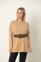 Cinto elástico con hebilla redonda con estampado animal print.