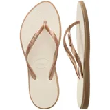 Ojotas Havaianas modelo Slim Point, con base color violeta claro y borde lateral en tono rojizo. Presentan tiras finas con textura y logo de la marca en relieve.