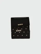 Set de dos pares de medias Boss de color negro, con diseño de lunares pequeños y logo de la marca bordado en tono dorado.
