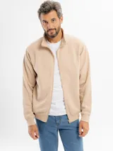 Campera de felpa azul con cierre frontal completo, cuello alto y puños acanalados.