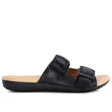 Sandalias bajas de cuero sintético negro, con doble tira ancha ajustable con hebillas metálicas negras.