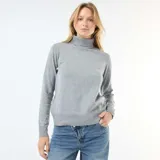 Sweater de punto fino en color gris, con cuello alto y mangas largas. Presenta puños y ruedo acanalados para un ajuste cómodo.