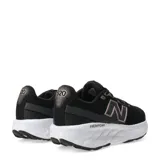 Championes de running New Balance modelo Fresh Foam 520 para mujer. Presentan un diseño en color negro con detalles en tono rosado metalizado en el logo lateral y la lengüeta. Cuentan con una entresuela blanca con tecnología Fresh Foam para mayor amortiguación y suela de goma negra.