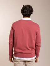 Sweater azul marino de algodón con cuello en V y logo bordado en el pecho.